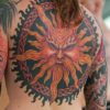 Татуировка в виде солнца: что означает