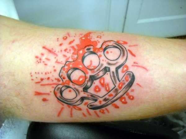 Значение татуировки кастет